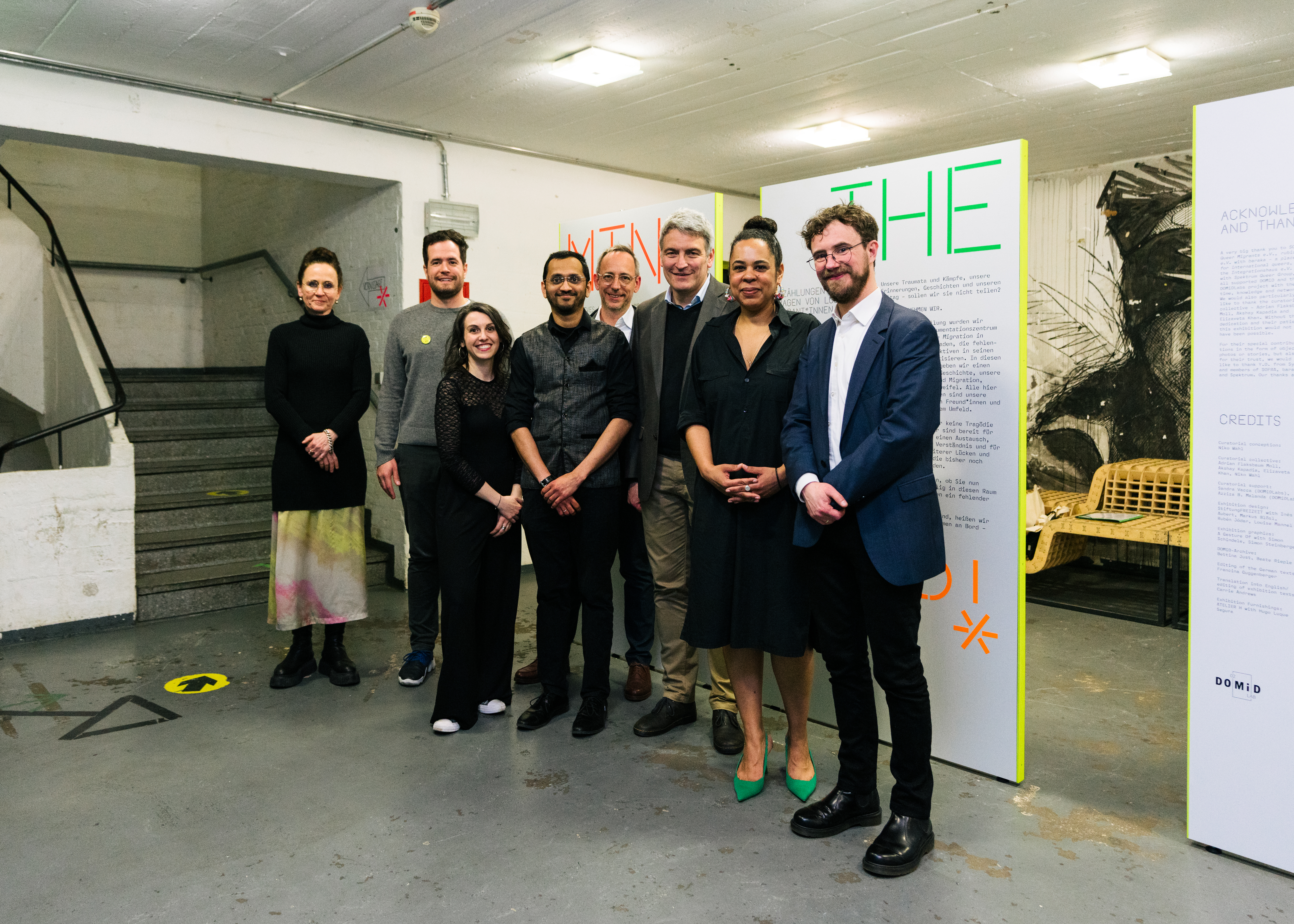 The exhibition was opened by (from left to right) Uta Schnell (Head of Funding and Programmes at the German Federal Cultural Foundation), Adrian Flaksbaum Moll (Curatorial Collective), Sandra Vacca (Project Manager DOMiDLabs), Akshay Kapadia (Curatorial Collective), Niko Wahl (Curatorial Collective), Lorenz Bahr (State Secretary for Integration at the MKJFGFI of the State of NRW), Azziza B. Malanda (PR/Public Relations, Deputy Project Manager DOMiDLabs), Dr. Robert Fuchs (Executive Director DOMiD). Photo: Fadi Elias – In-Haus Media 2023