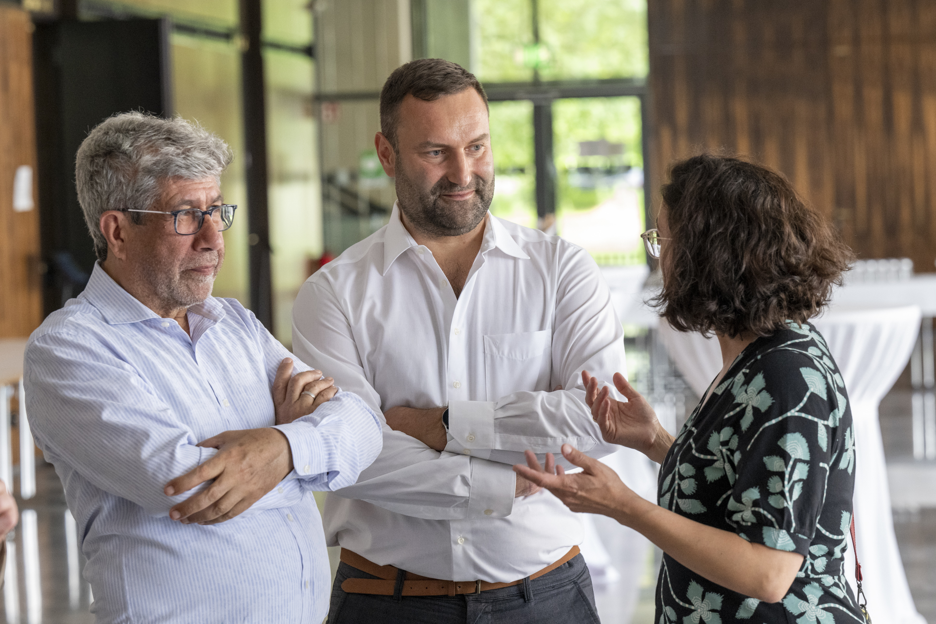 Ahmet Sezer (DOMiD board member) and Timo Glatz (Head of Marketing & Communication at DOMiD) in conversation with DOMiD board member Elif Şenel. photo: Uwe Weiser / LVR